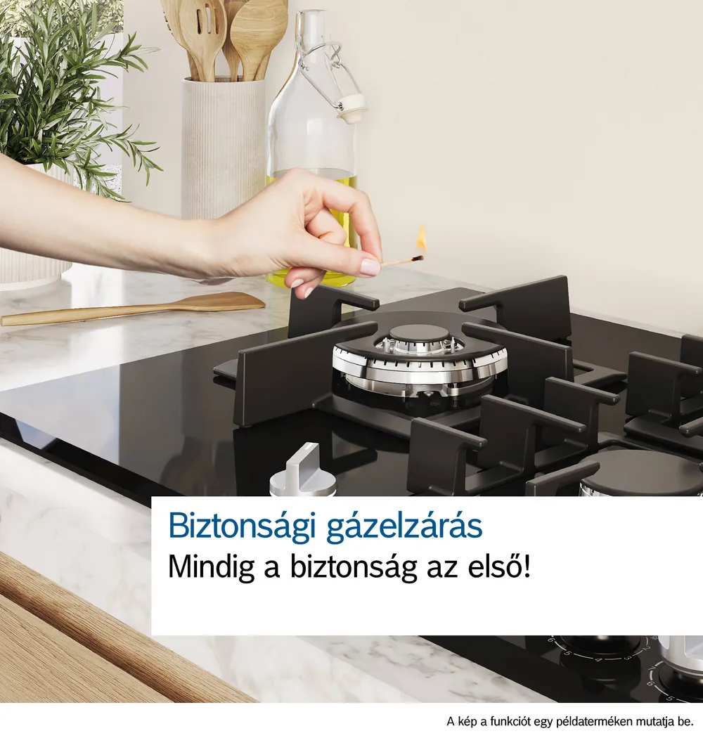 Egy kéz meggyújt egy gáztűzhelyet. Magyar felirat, 'Mindig a biztonság az első!'
