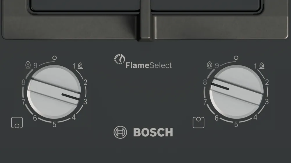 Közelkép egy Bosch gáztűzhelyről, gombokkal és a FlameSelect logóval.