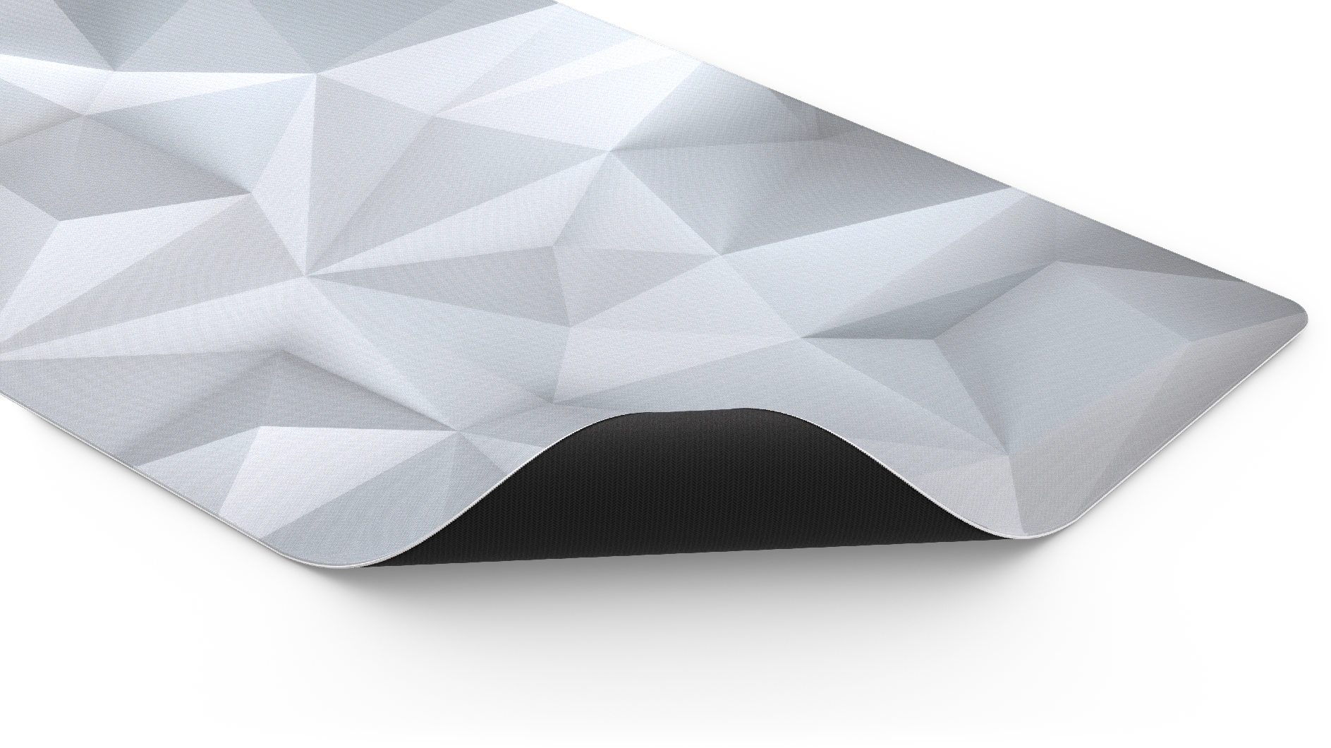 Fehér, geometriai mintás szőnyeg. Hullámos szélű, fekete alsó résszel. A szőnyeg fekete felületen van.