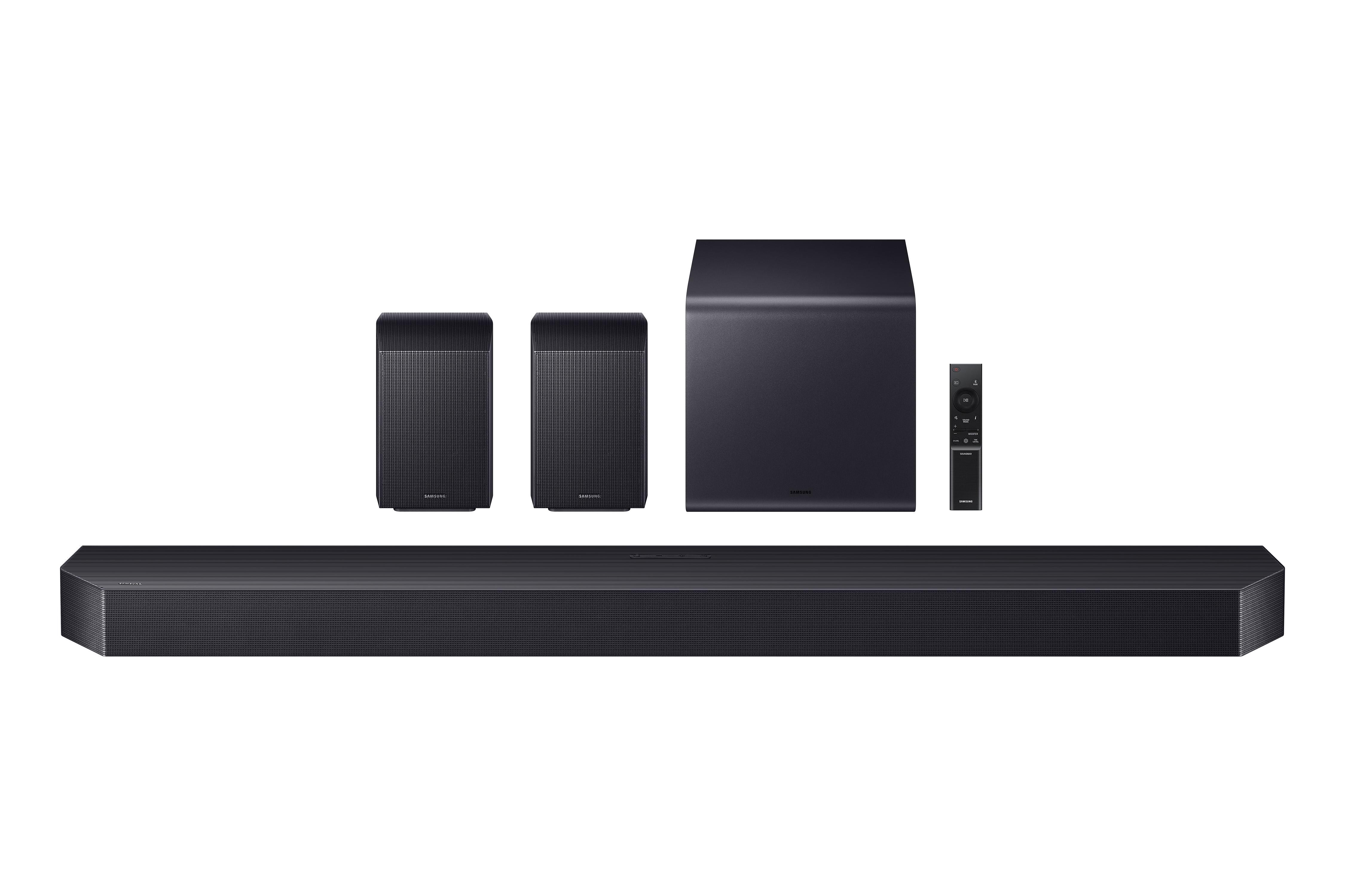 Eine schwarze Soundbar mit zwei Lautsprechern und einem Subwoofer, alles auf weißem Hintergrund.