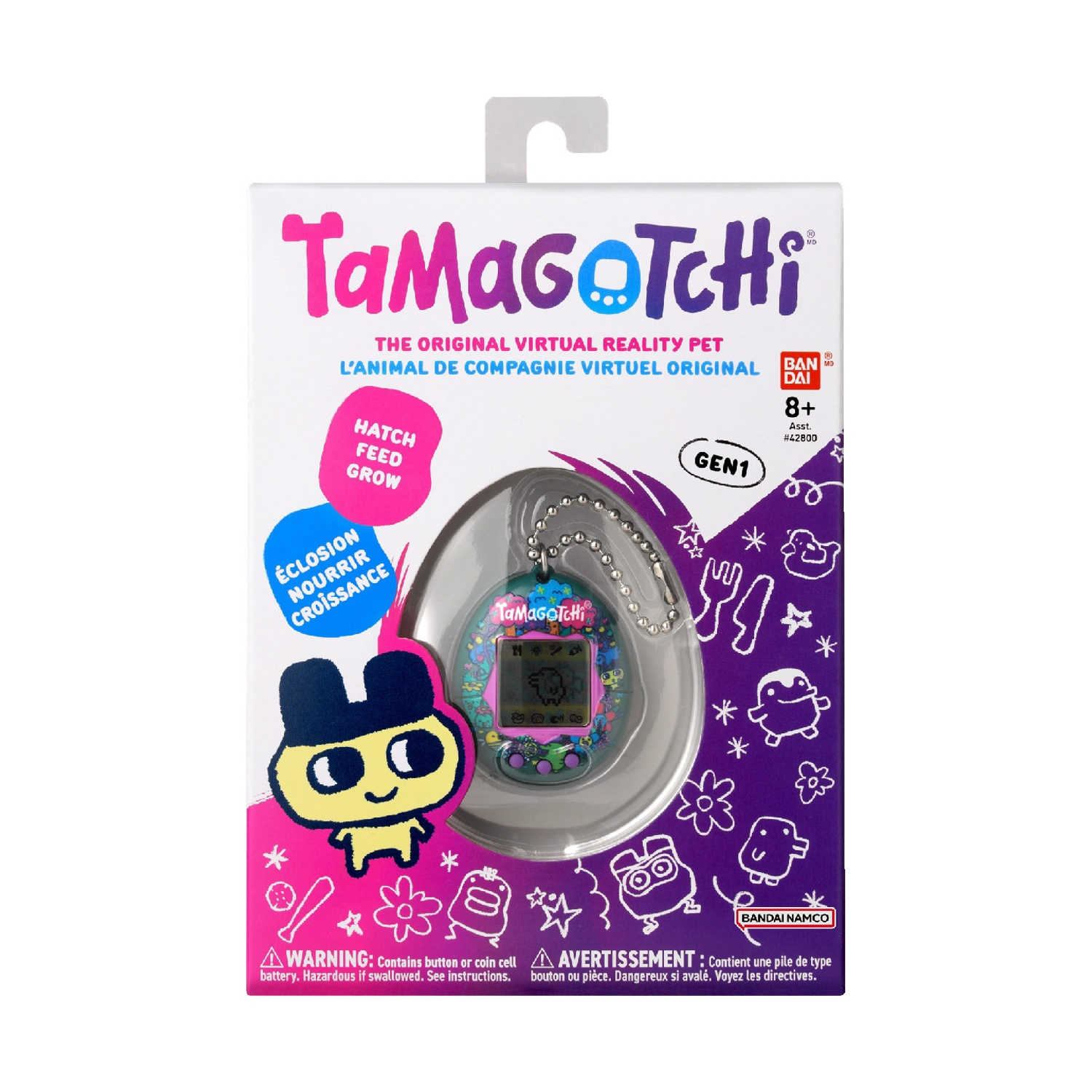 Una scatola di Tamagotchi. Presenta il logo Tamagotchi e un'illustrazione del dispositivo e dei personaggi.