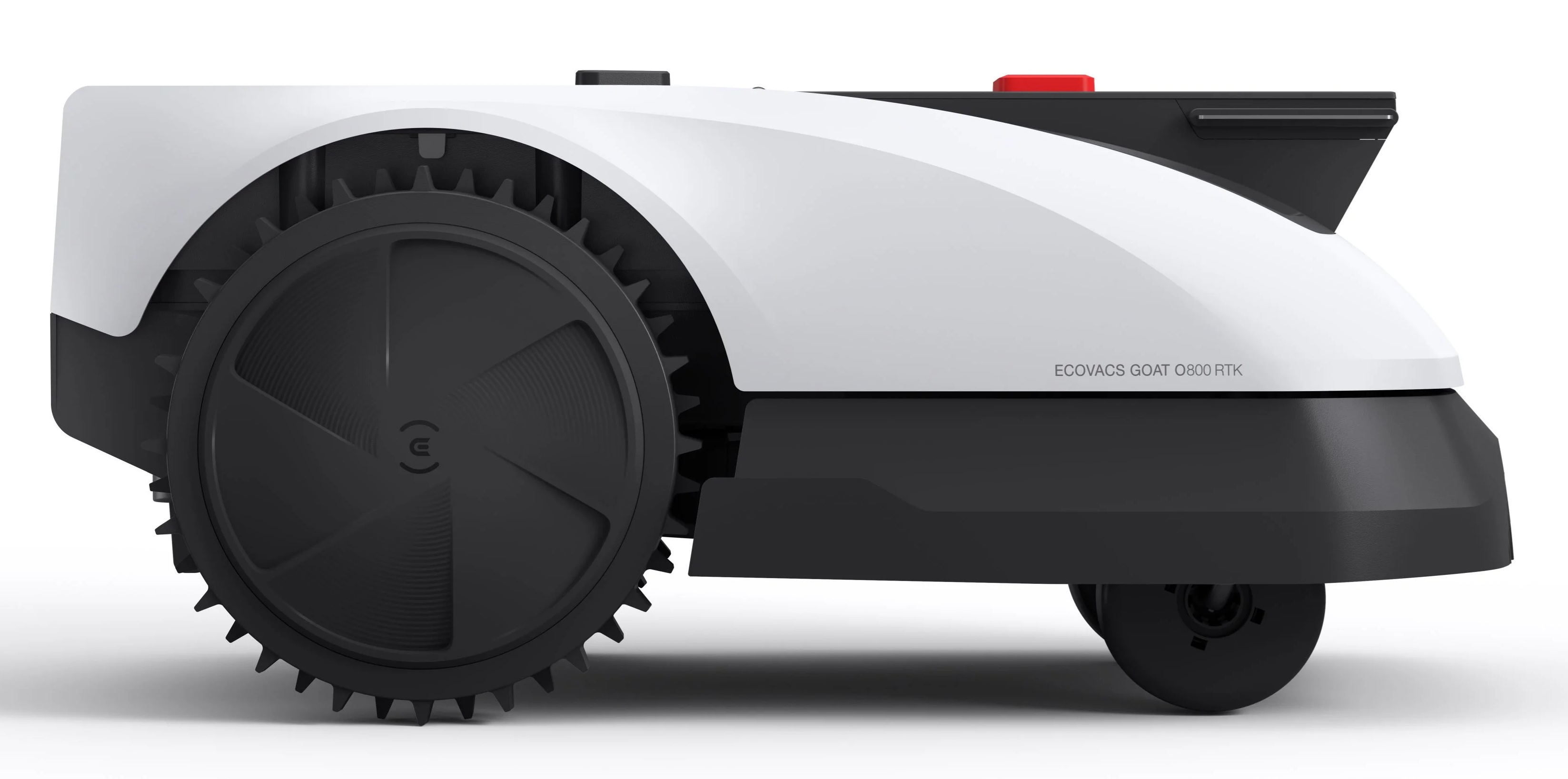 Biało-czarna kosiarka robot. Ma duże koło zębate i czarną górę.