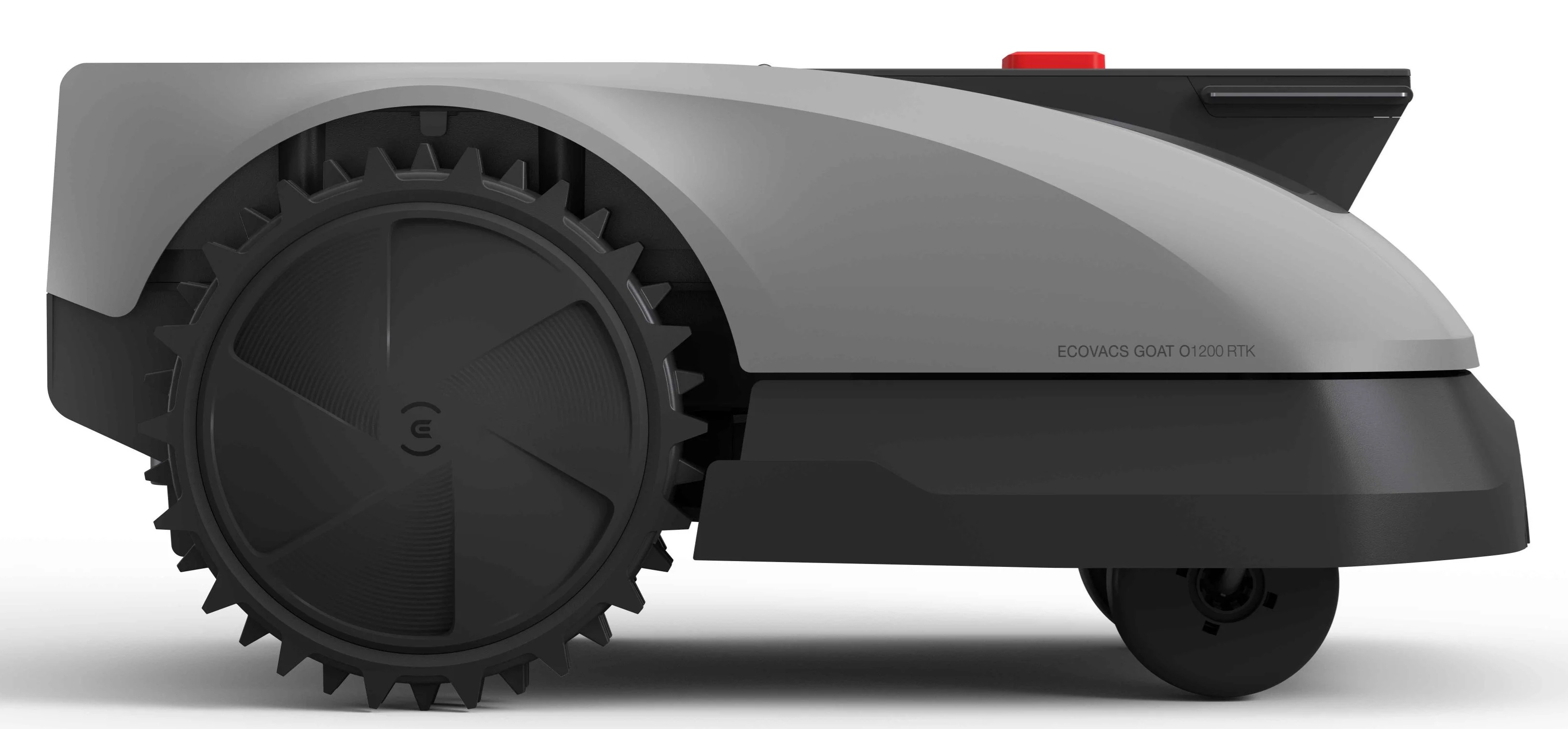 Zbliżenie robota koszącego. Szary i czarny z dużym kolczastym kołem. Tekst: ECOVACS GOAT O1200 RTK.