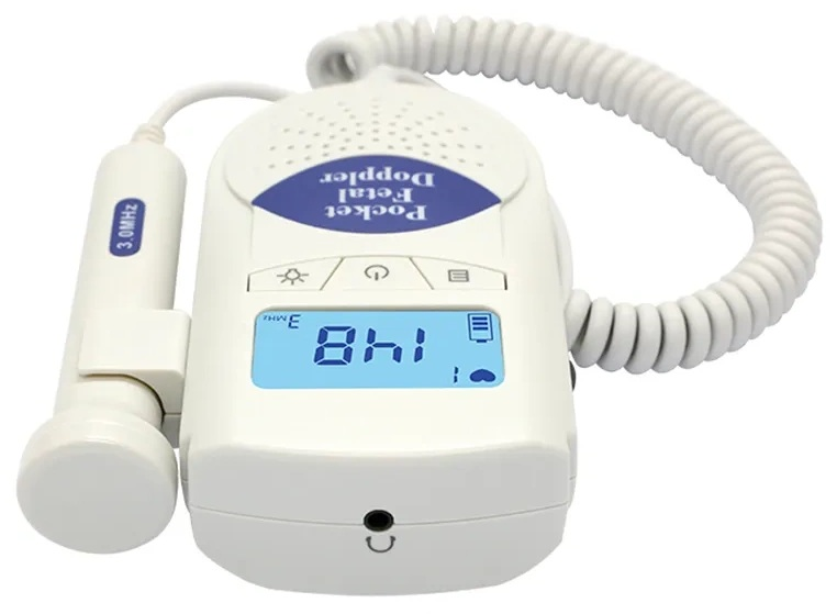 Biały kieszonkowy detektor tętna płodu z wyświetlaczem pokazującym tętno.