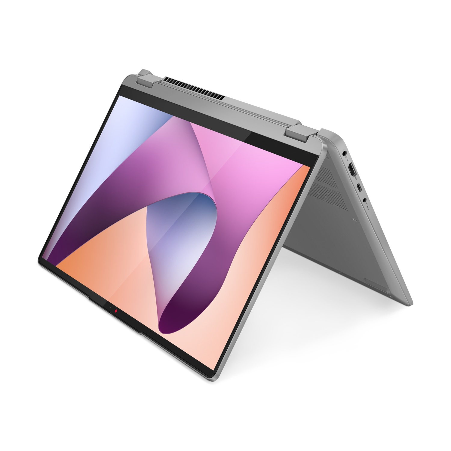 Un laptop grigio con uno schermo colorato, aperto ad angolo.
