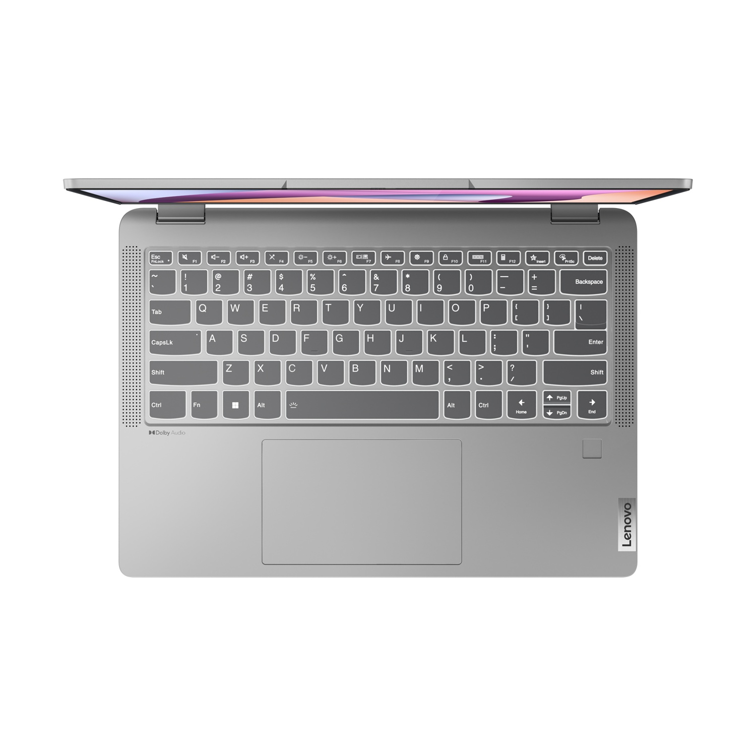 Tastiera del laptop, vista dall'alto, che mostra un laptop argentato su sfondo bianco.