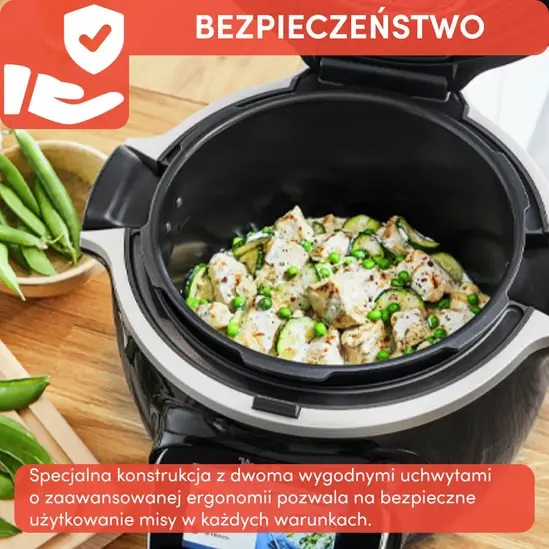 Czarny garnek z jedzeniem w środku, z ikoną bezpieczeństwa i tekstem o konstrukcji garnka.