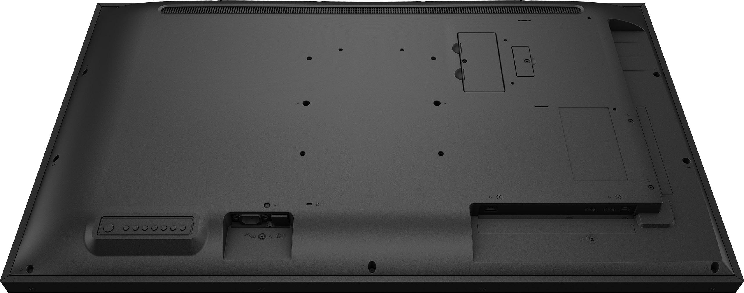 Schwarze TV-Rückwand mit Anschlüssen und Schrauben. Enthält einen Ein-/Ausschalter, HDMI und andere Anschlüsse.