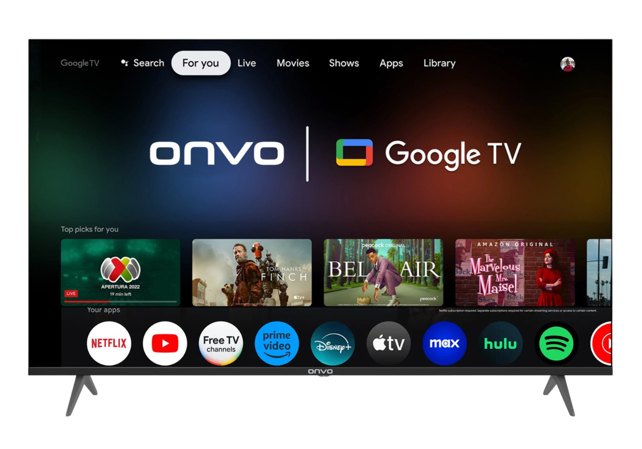 Onvo Google TV ekranı uygulamaları ve yayın hizmetlerini gösteriyor. Siyah çerçeve, ayaklar, karanlık arka plan.