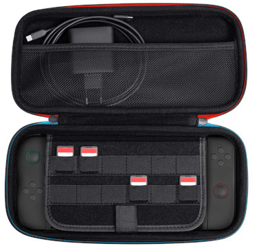 Otwarta obudowa z konsolą do gier, grami i akcesoriami. Schemat kolorów czerwony, niebieski i czarny.