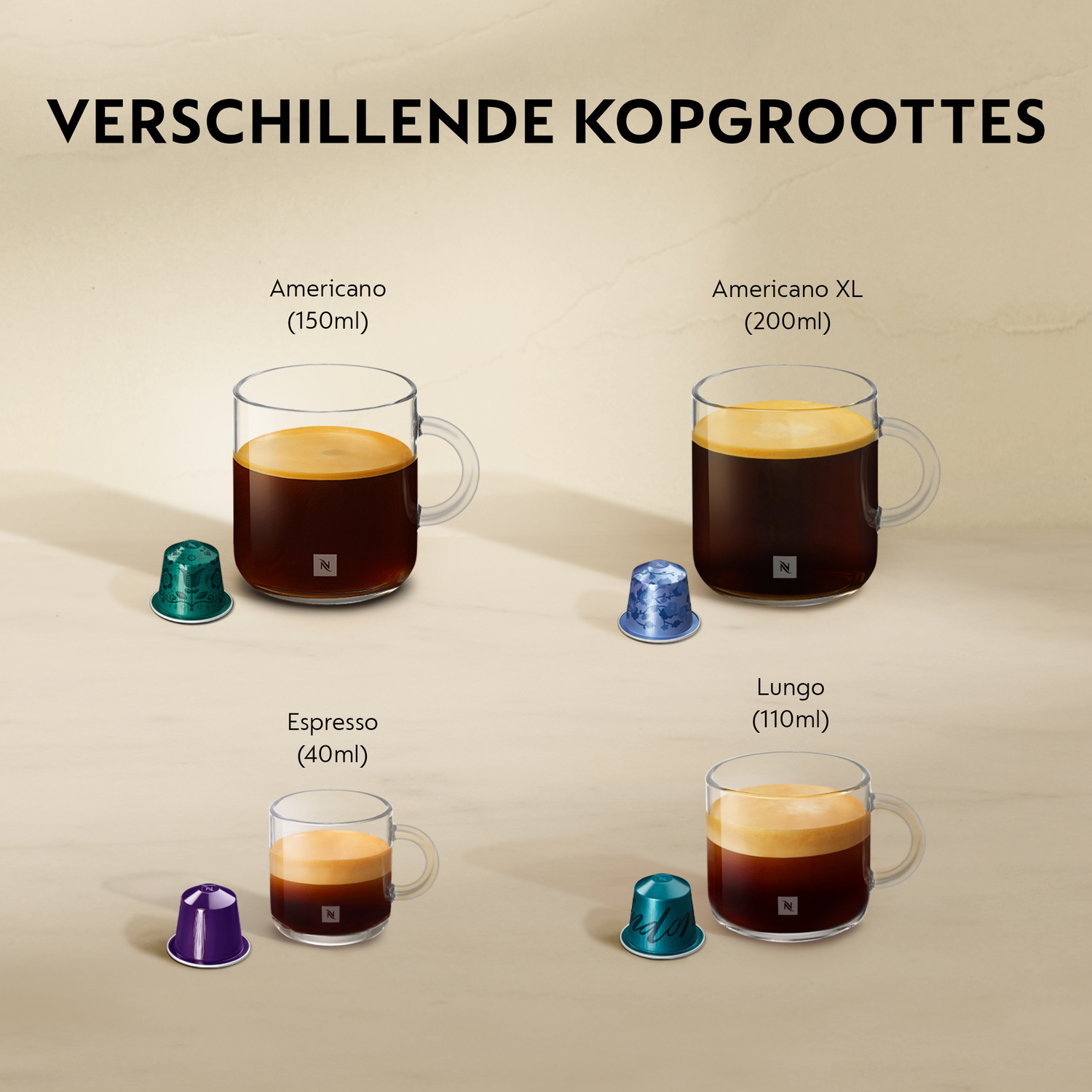 Four coffee cups of different sizes, with coffee capsules next to them.