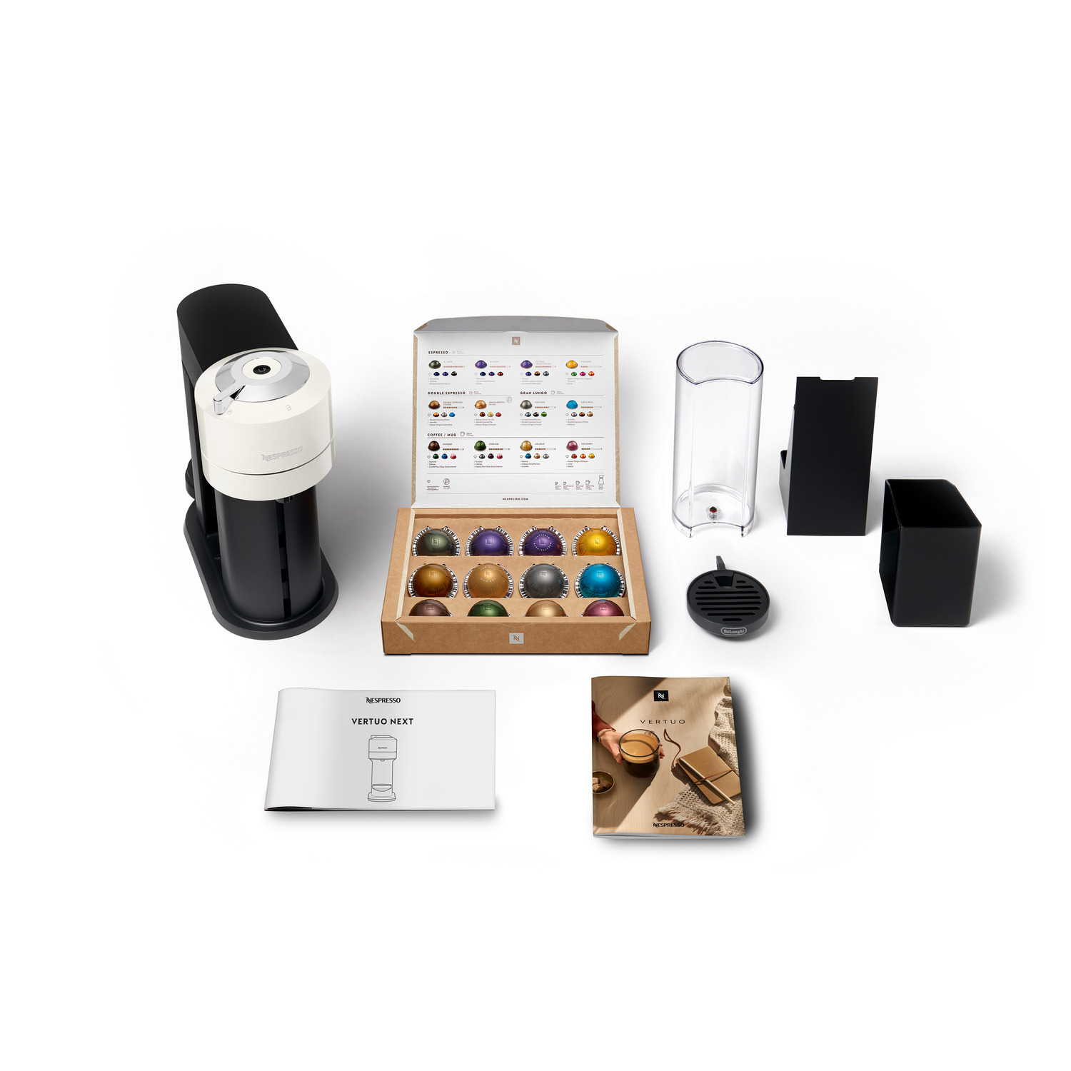 A coffee machine and its accessories are displayed on a white background.