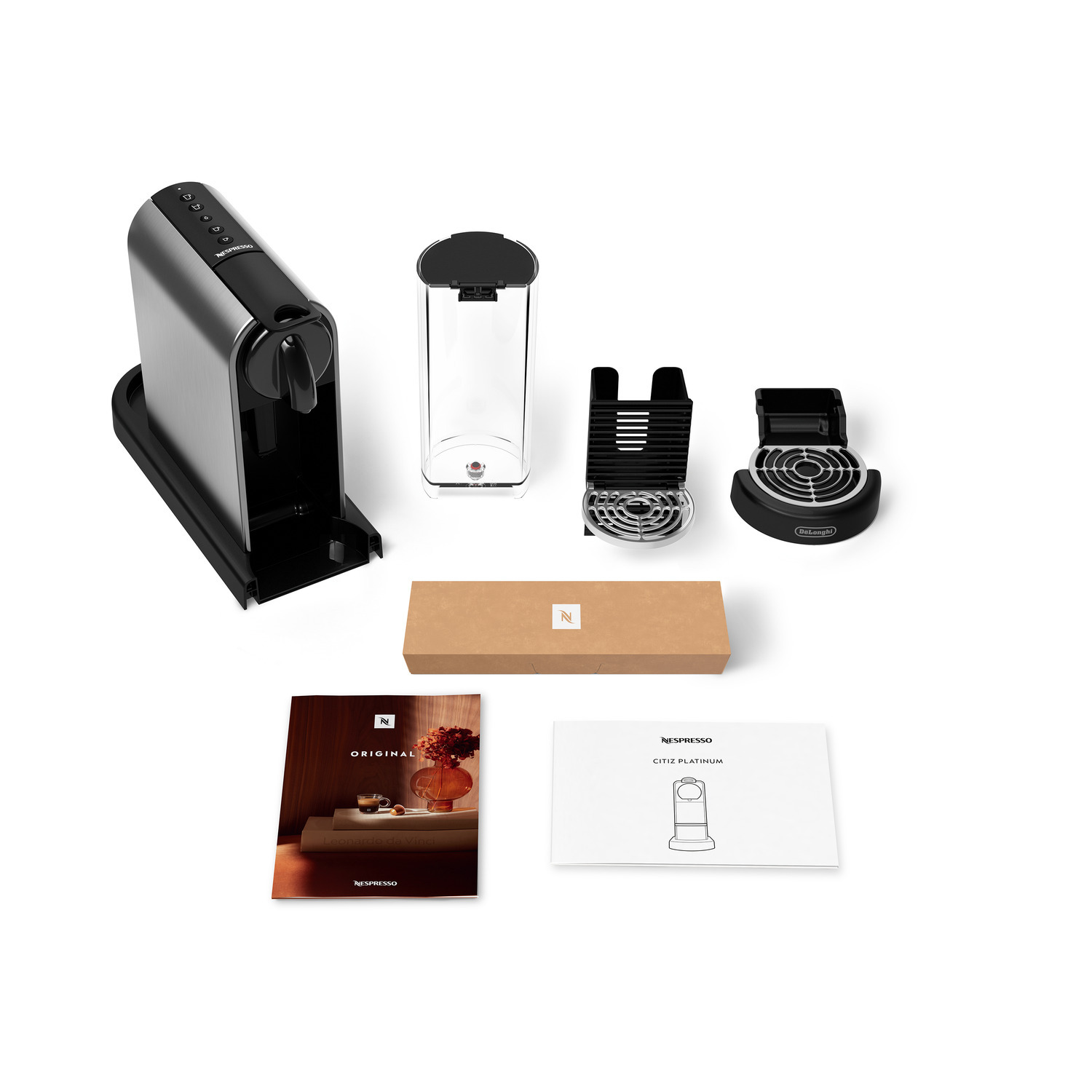 Coffee machine and parts. Accessories include water tank, drip tray, and manuals, white background.