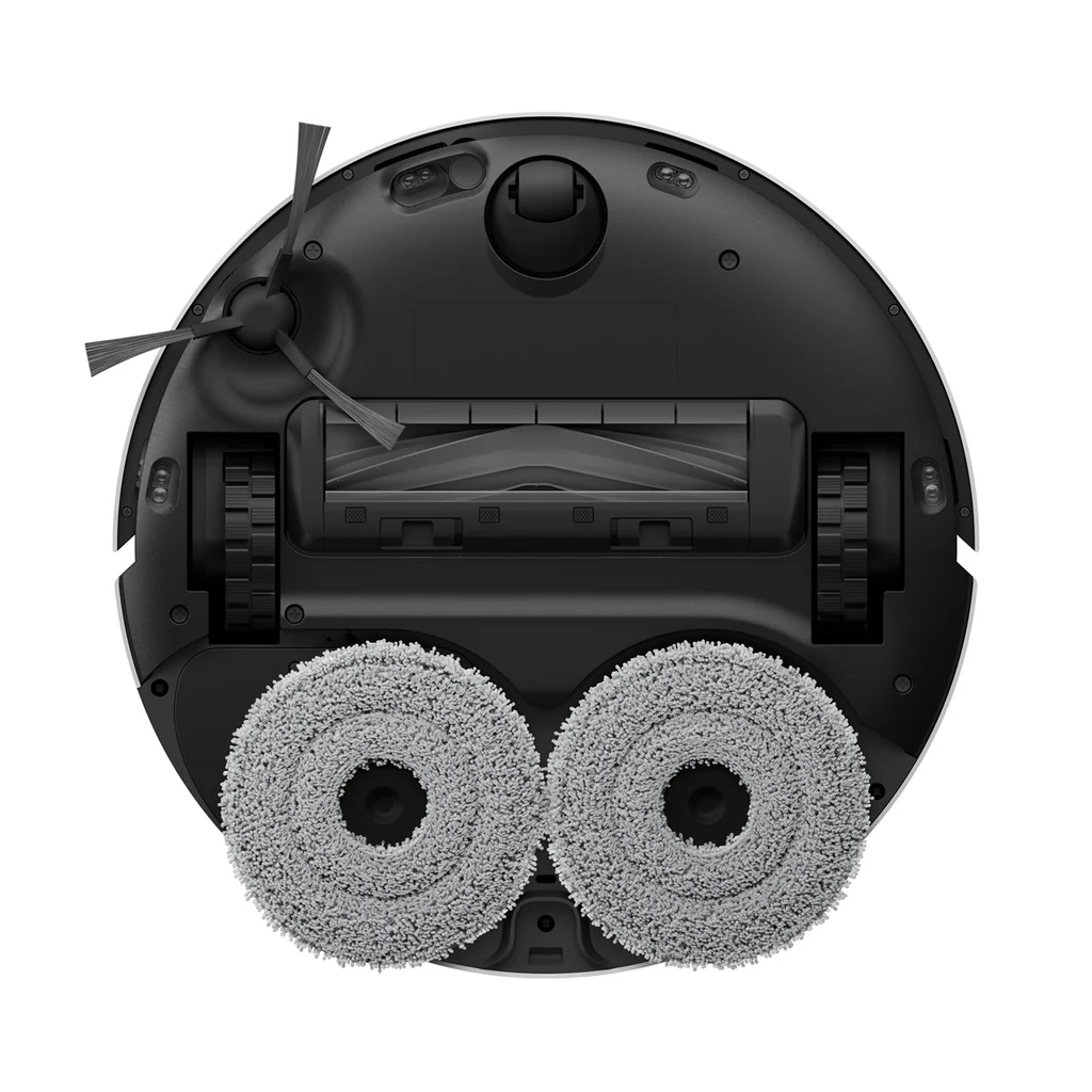 Aspiradora robot, vista inferior. Muestra cepillos, ruedas y almohadillas de limpieza. Diseño blanco y negro.