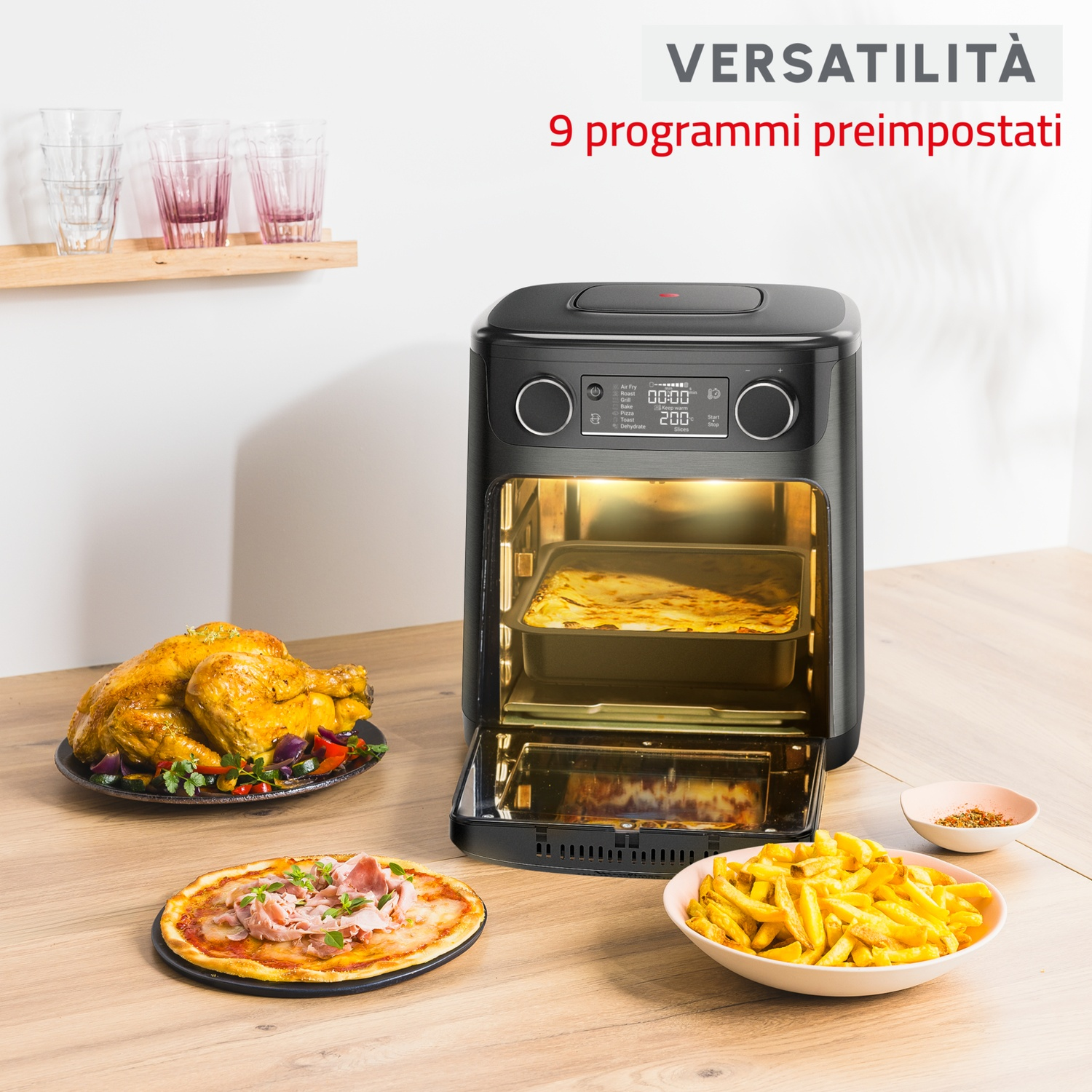 Friggitrice ad aria nera con cibo all'interno e sul tavolo. Testo: VERSATILITÀ, 9 programmi preimpostati.