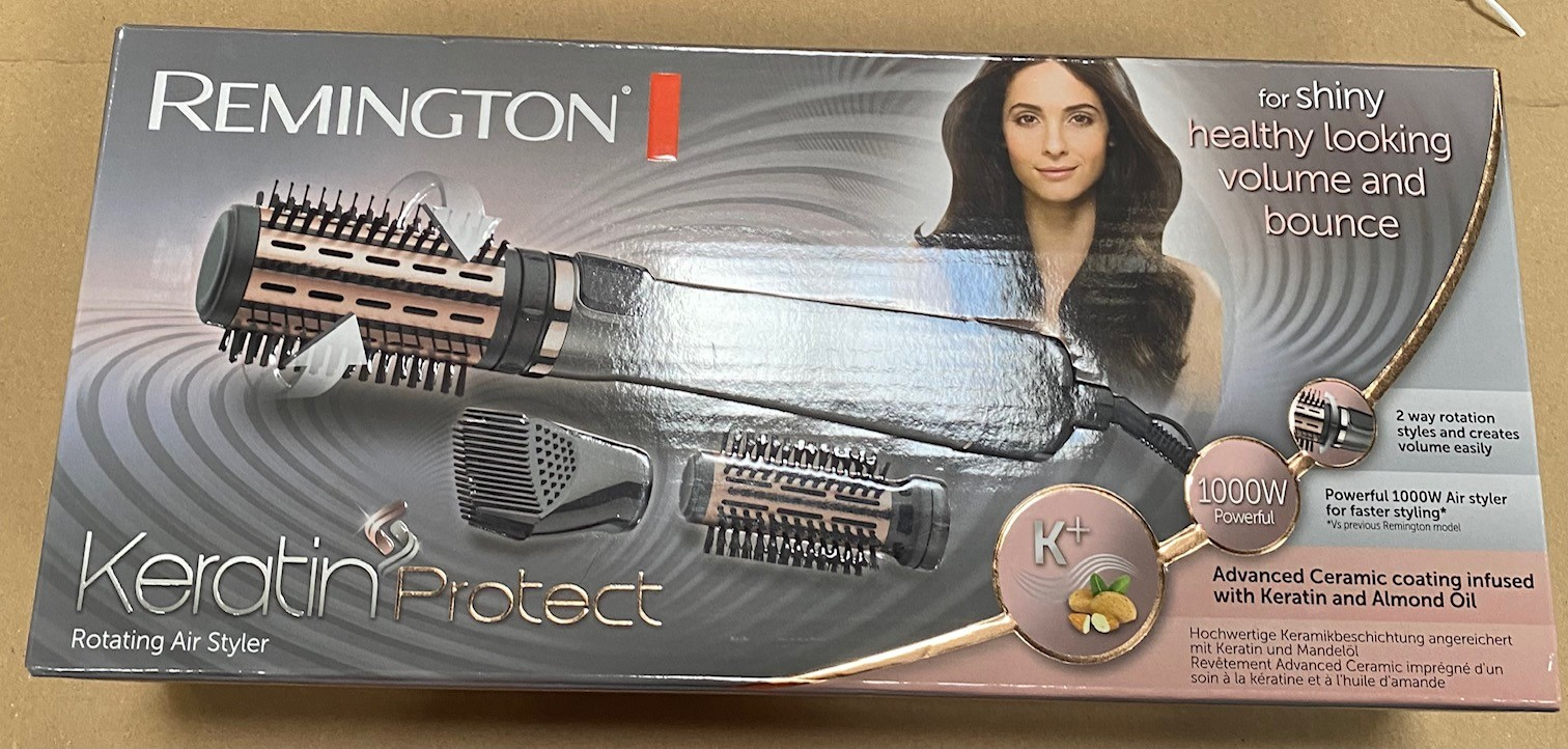 Pudełko obrotowej lokówki Remington Keratin Protect, z produktem i wizerunkiem kobiety.