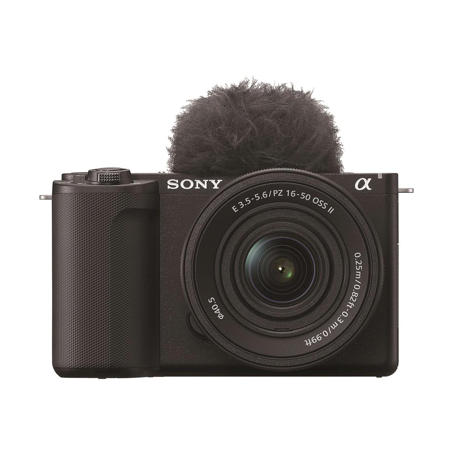 Fotocamera Sony nera con microfono sopra. L'obiettivo è al centro.
