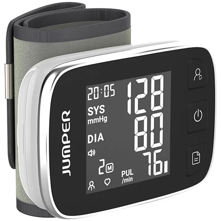 Ciśnieniomierz pokazuje 128/80, 76 tętno. Szary mankiet przymocowany.