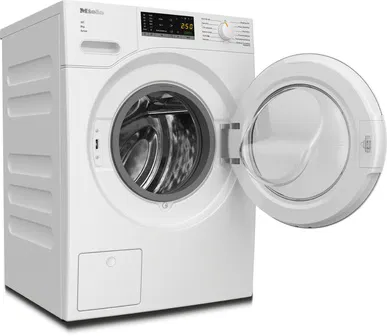 Kapısı açık, tamburu gösteren beyaz bir çamaşır makinesi. Marka Miele.
