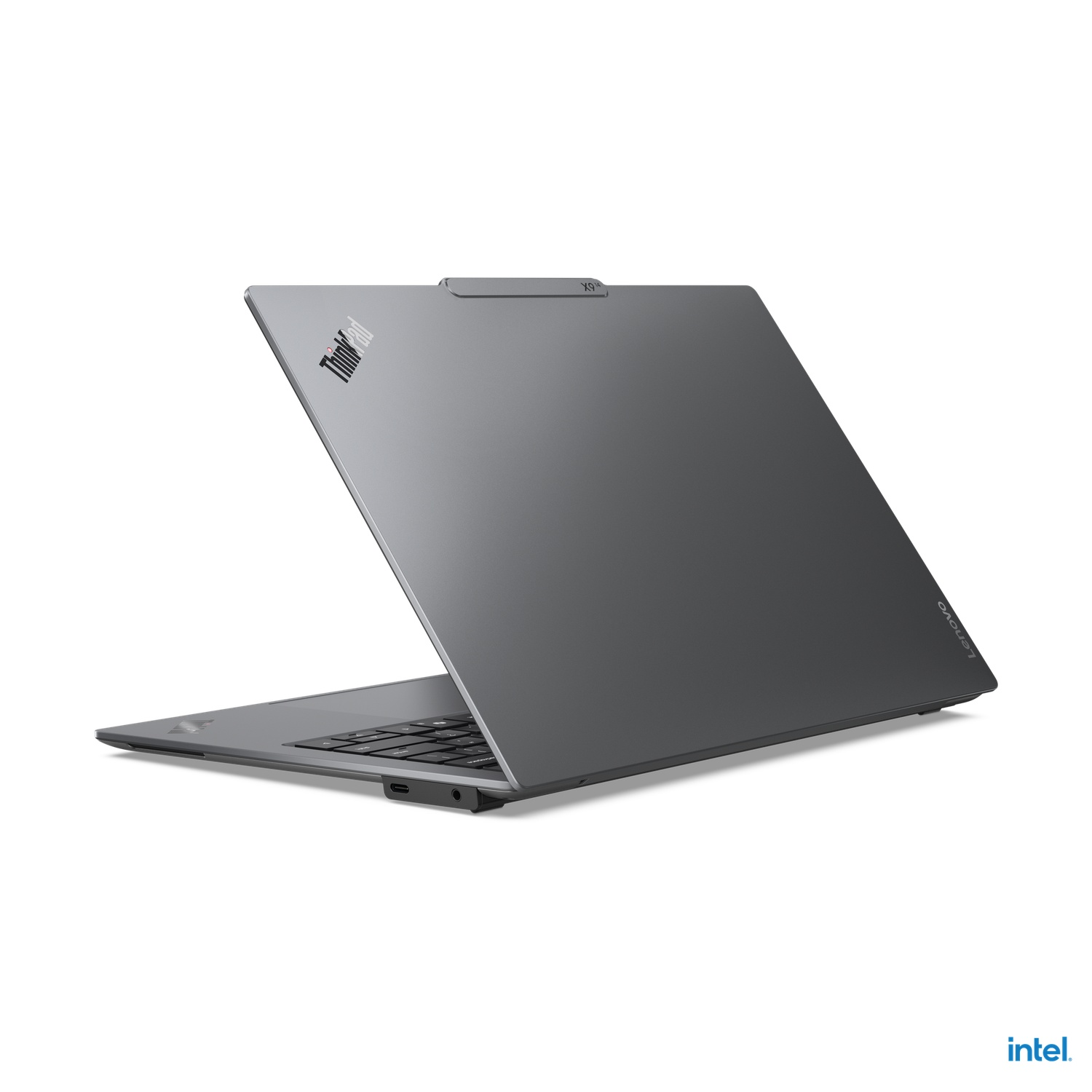 A silver laptop from the back and side, showing the open screen and the ThinkBook logo.