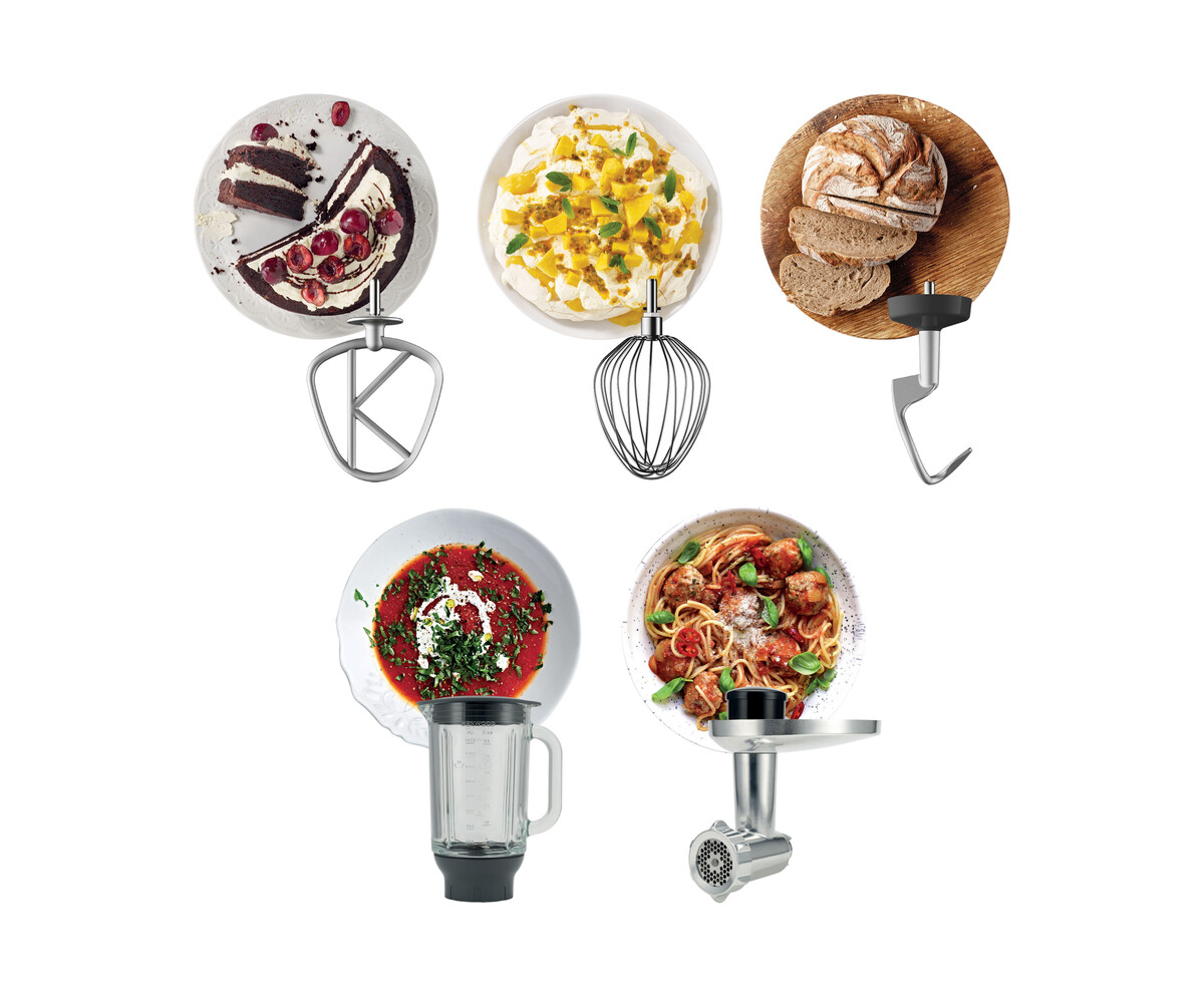 Talerze z różnymi daniami i przyborami kuchennymi. Białe tło.