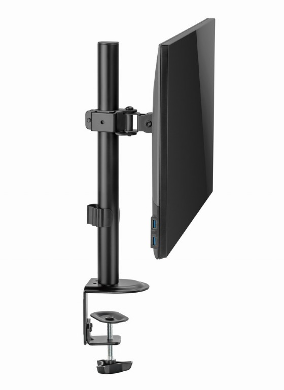 Egy fekete monitor fekete állványra van szerelve. A monitor függőleges, USB-portok láthatók.