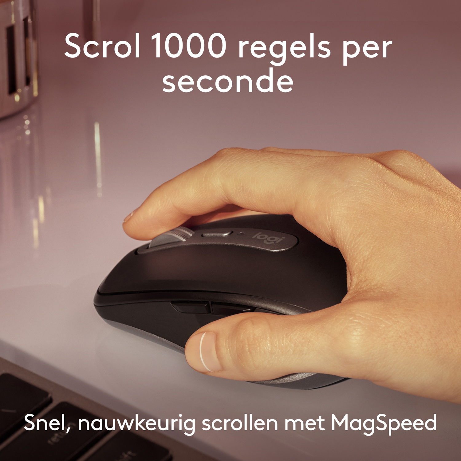 Person's hand using a black Logitech mouse. Text says, 'Scroll 1000 lines per second' and 'MagSpeed'.