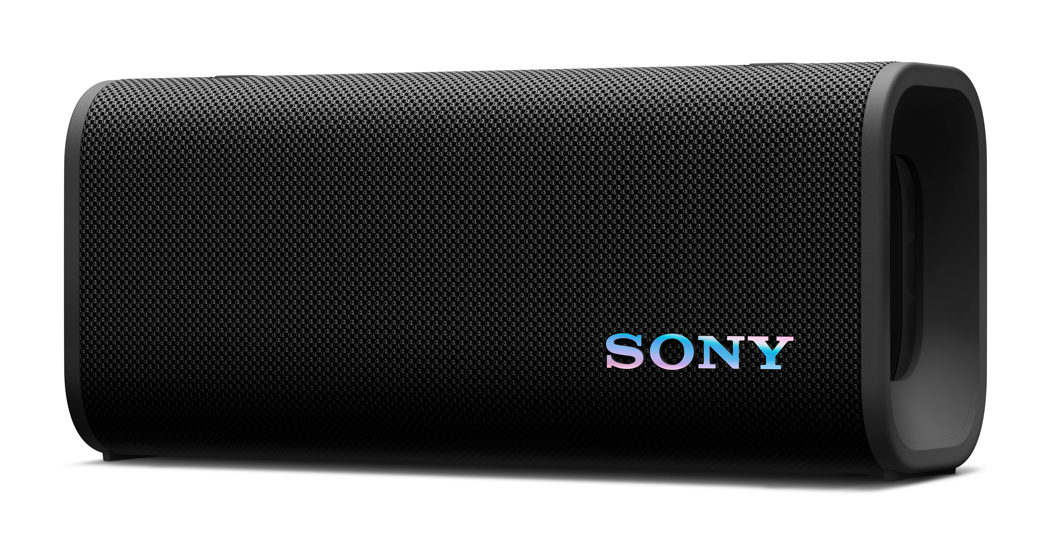 Czarny głośnik Sony z siatkowym przodem, spoczywający na białej powierzchni.