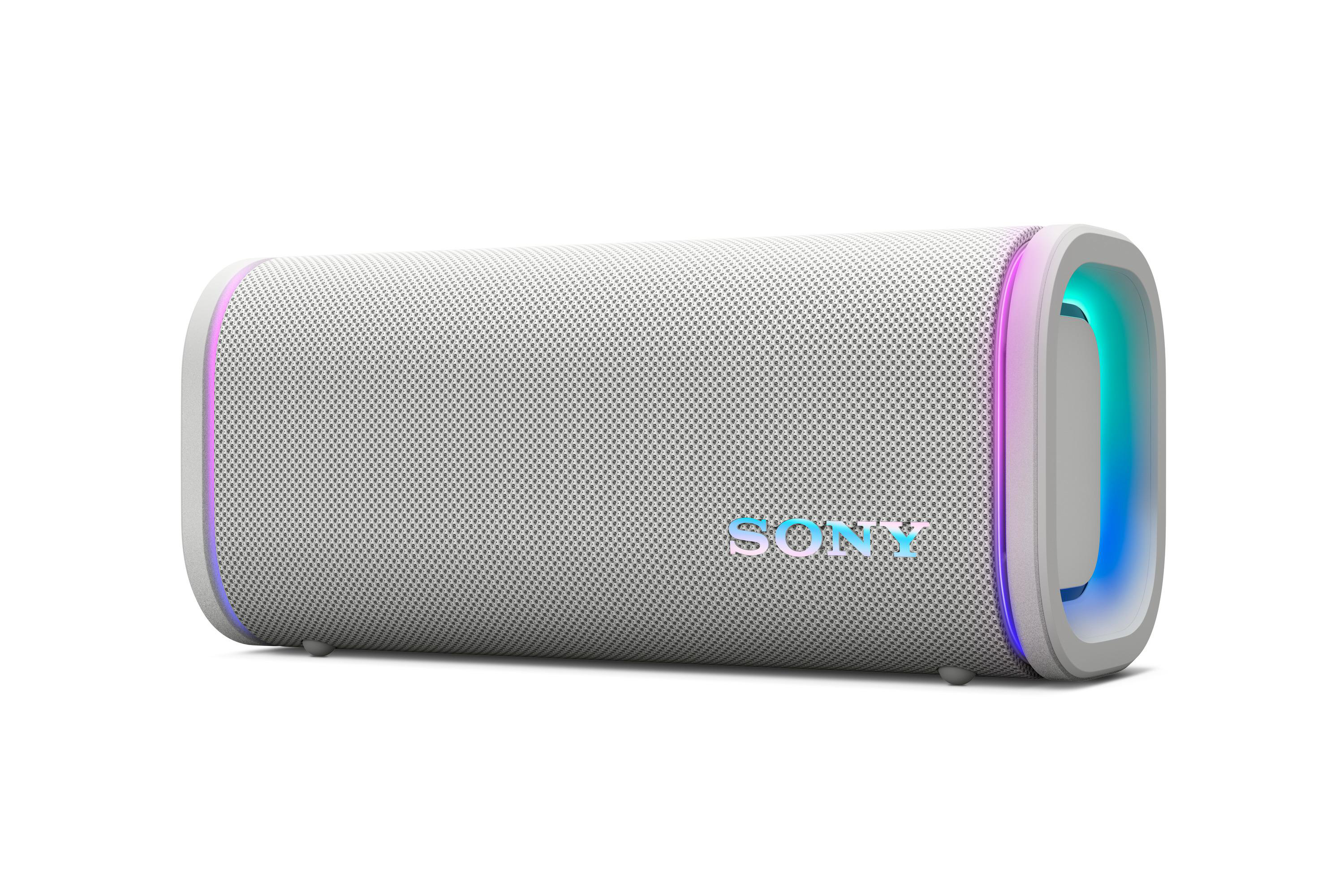 Ein weißer Lautsprecher mit farbigen Lichtern am Ende und dem Wort SONY.