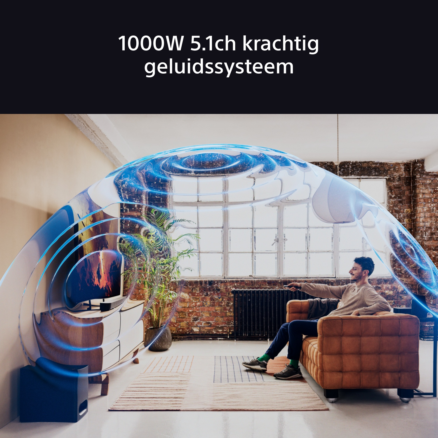 Man on sofa with TV sound wave visualization, 1000W. Modern living room setting.
