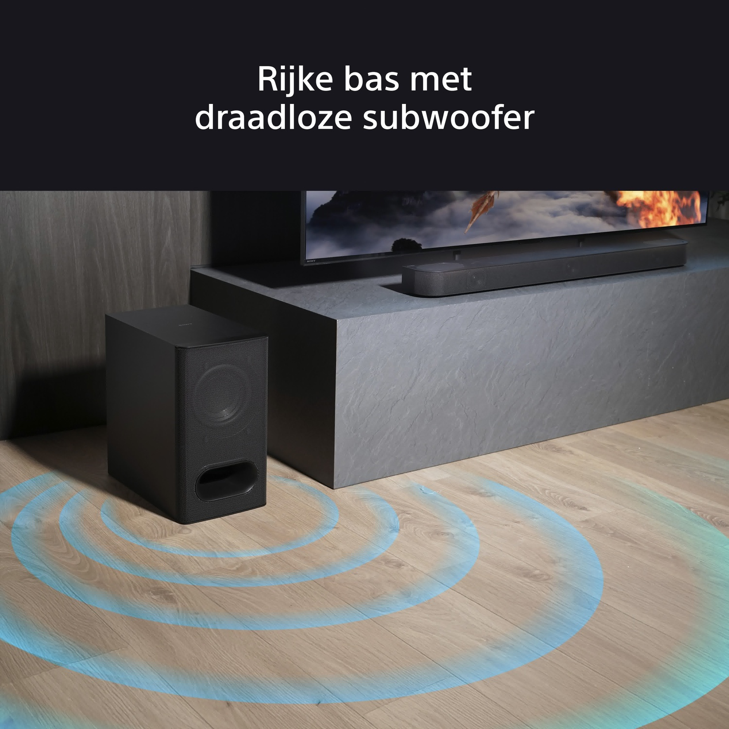 Home theater setup with a subwoofer and sound bar. Blue sound waves on the floor.