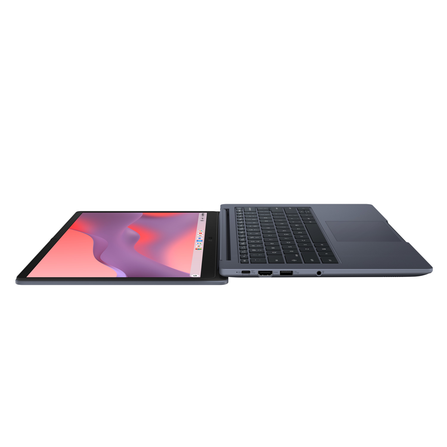A gray laptop is open, the screen displays a pink and purple abstract image. The keyboard is to the right.