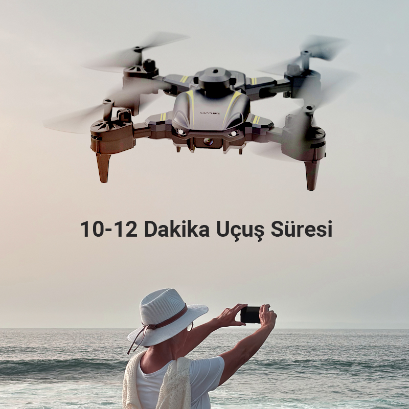 Gökyüzünde uçan drone, sahilde fotoğraf çeken kişi.