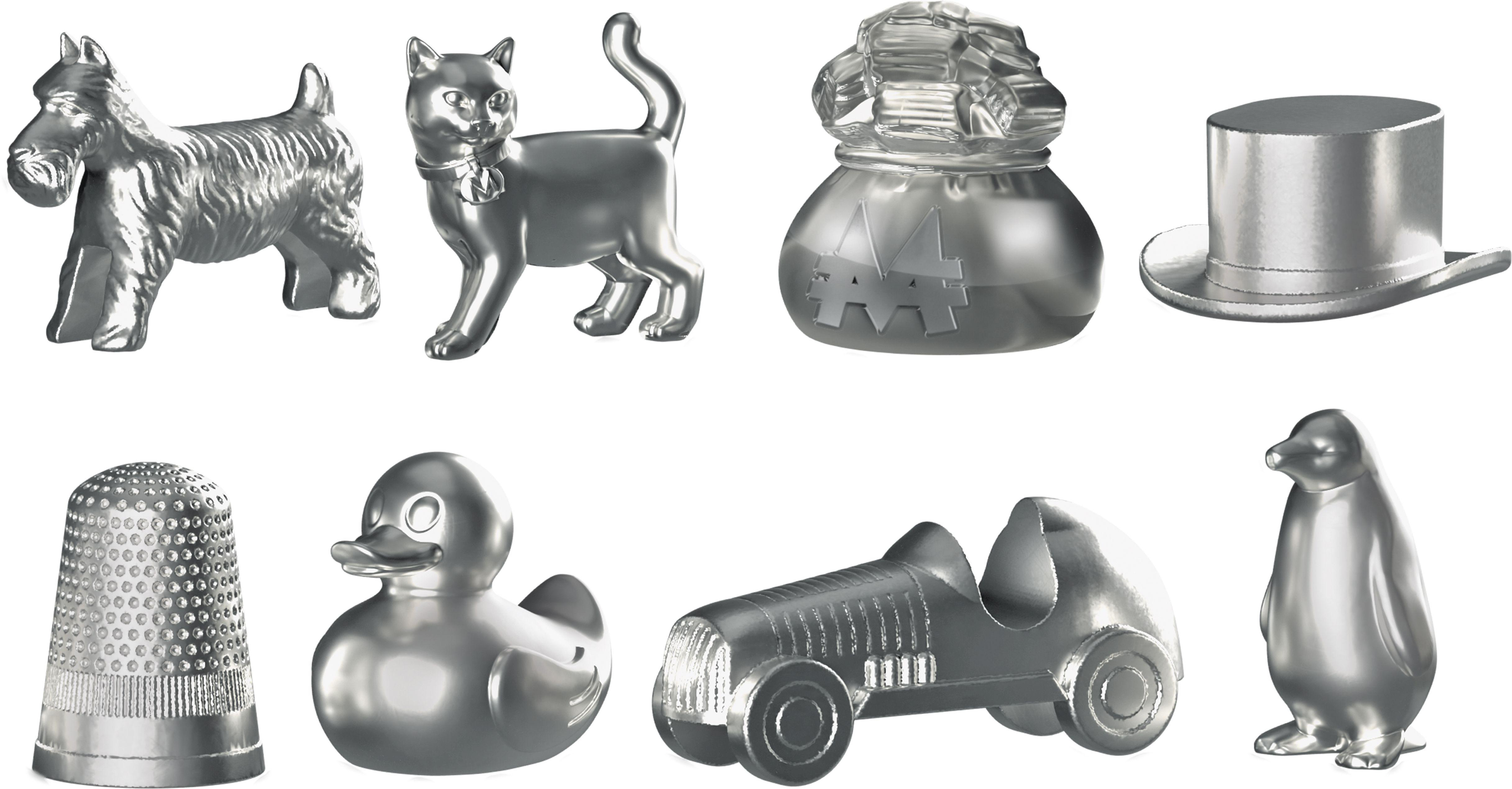 Monopoly-Spielfiguren. Der Hund, die Katze, die Geldbörse, der Hut, der Fingerhut, die Ente, das Auto und der Pinguin sind sichtbar.