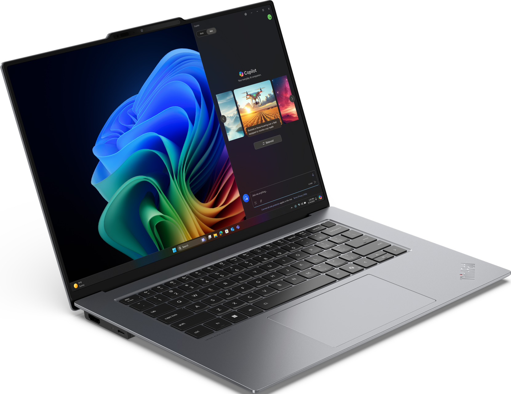 Laptop, geöffnet, zeigt ein Programm mit Bildern und Text.