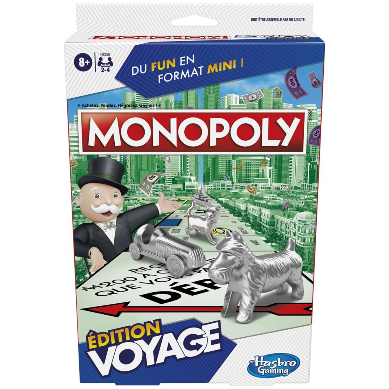 A Monopoly board game box with a city scene and game pieces.