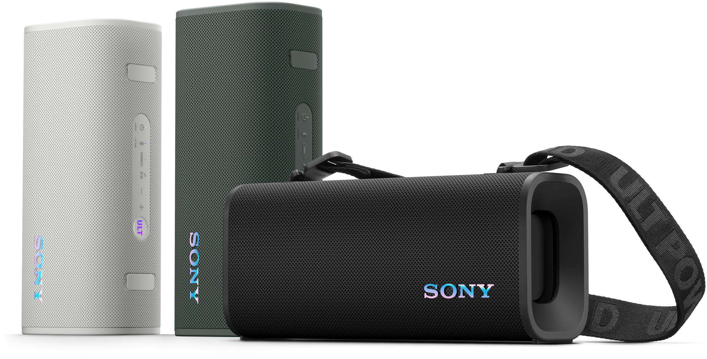 Három Sony hangszóró, fehér, zöld és fekete, fehér háttéren.