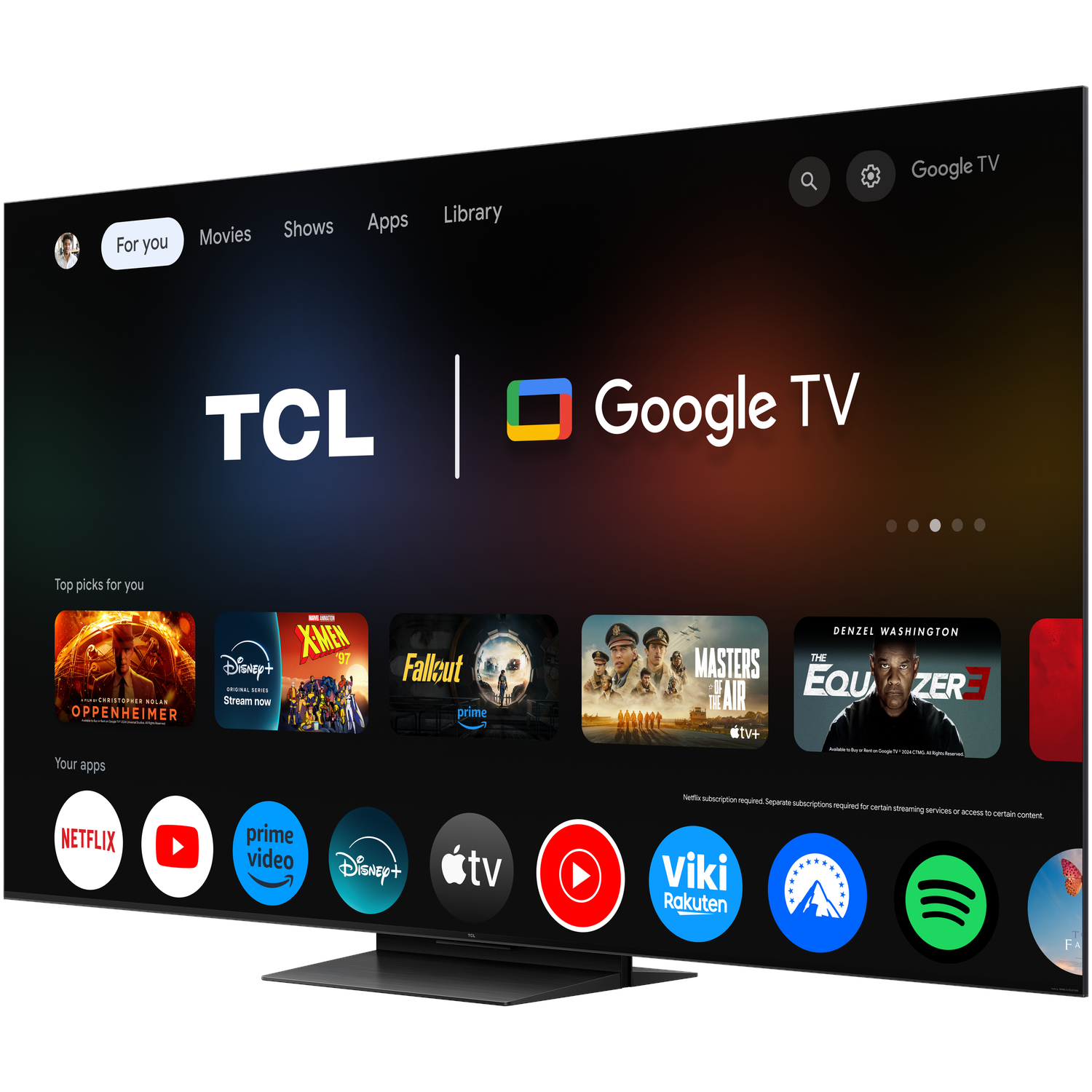 The back of a black television with two circular features and a grid pattern.