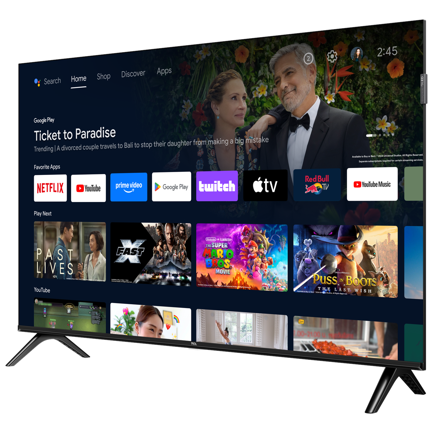 Large TV displays a movie scene. Several apps are shown on the screen.