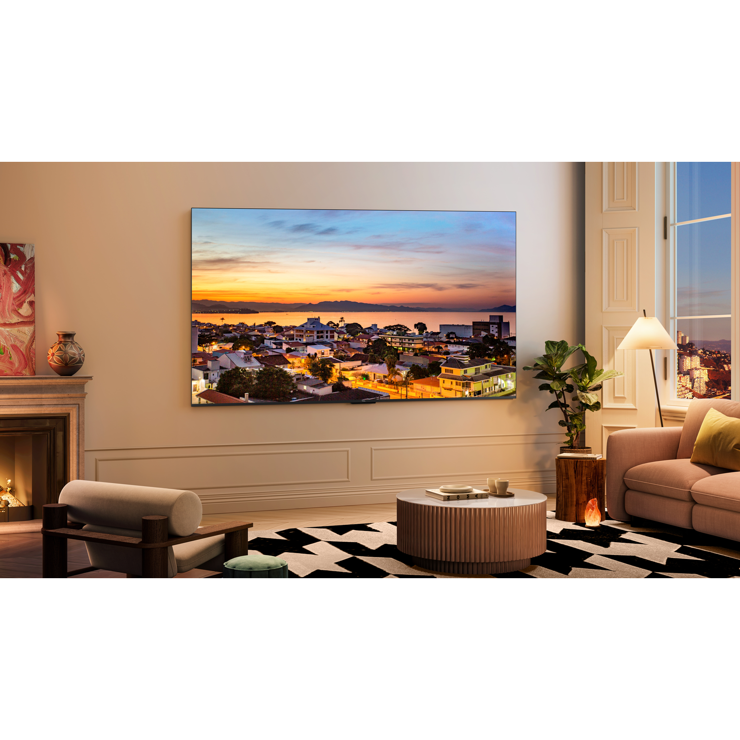 Living room with TV on the wall, showing a sunset view, fireplace, and modern furniture.