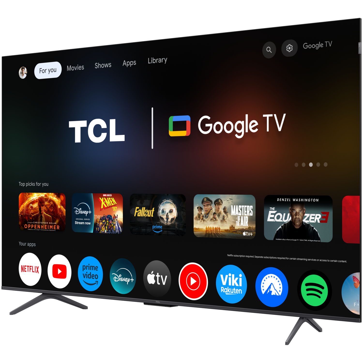 TCL Google TV screen displaying apps and movies, with a black frame and stand against a dark backdrop.