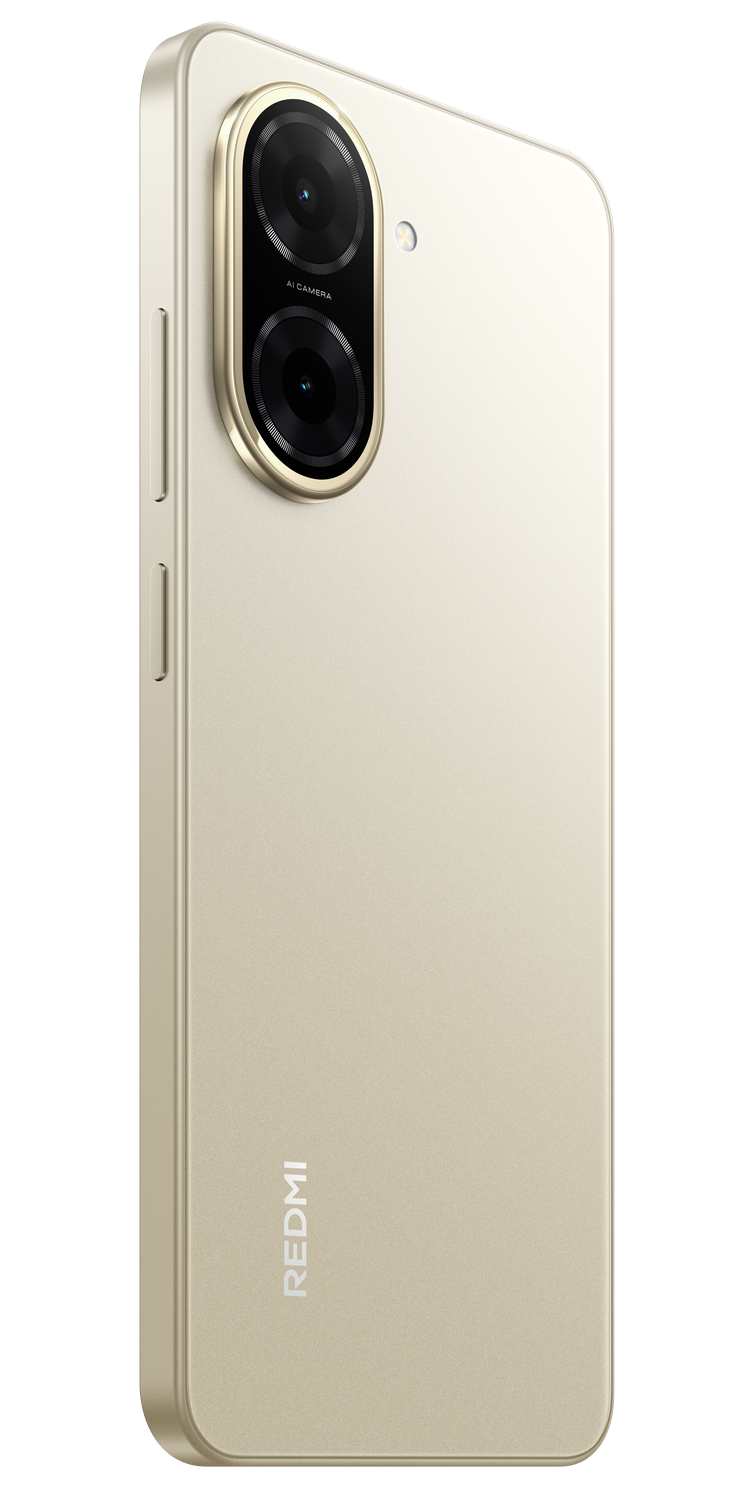 Parte trasera de teléfono dorado con cámara dual y logo Redmi, sobre fondo borroso.