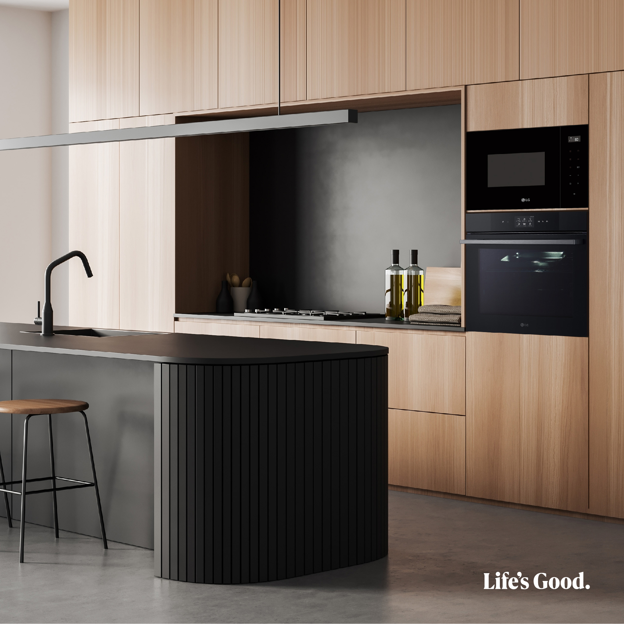 Interior de cocina moderna con gabinetes de madera, acentos negros y electrodomésticos LG.