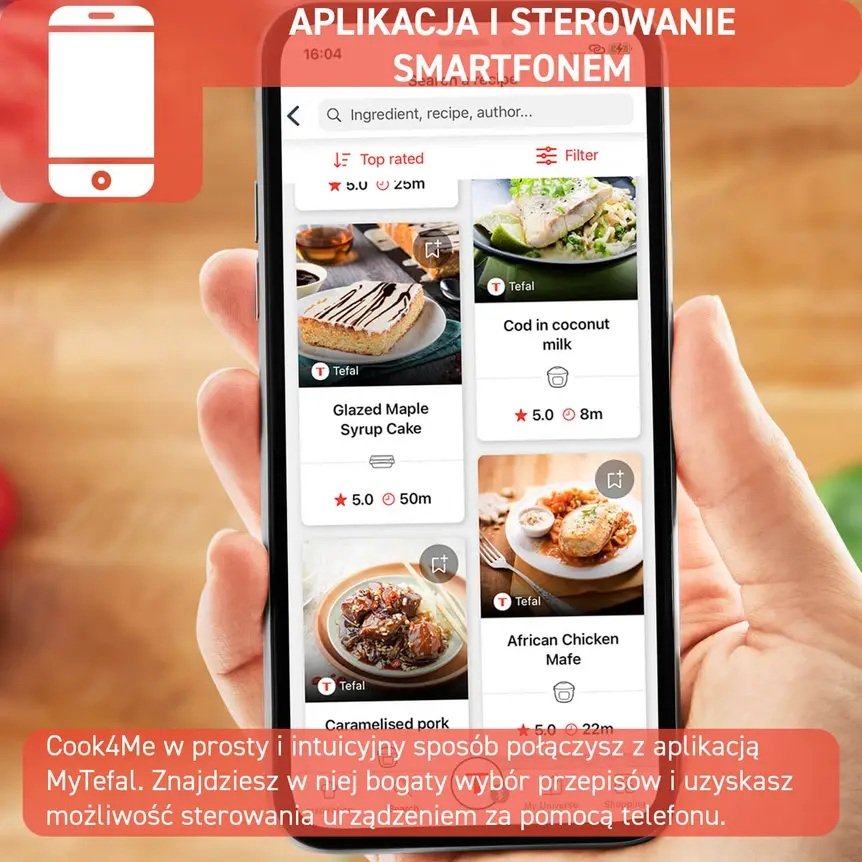 Dłoń trzymająca telefon z przepisami na ekranie z czerwoną ikoną w lewym górnym rogu.