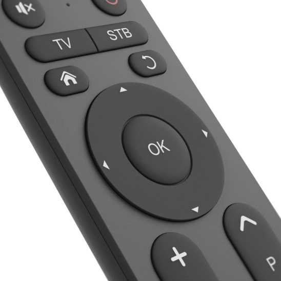 Szary pilot z przyciskami oznaczonymi jako 'TV', 'STB', 'OK' i przyciskami strzałek.