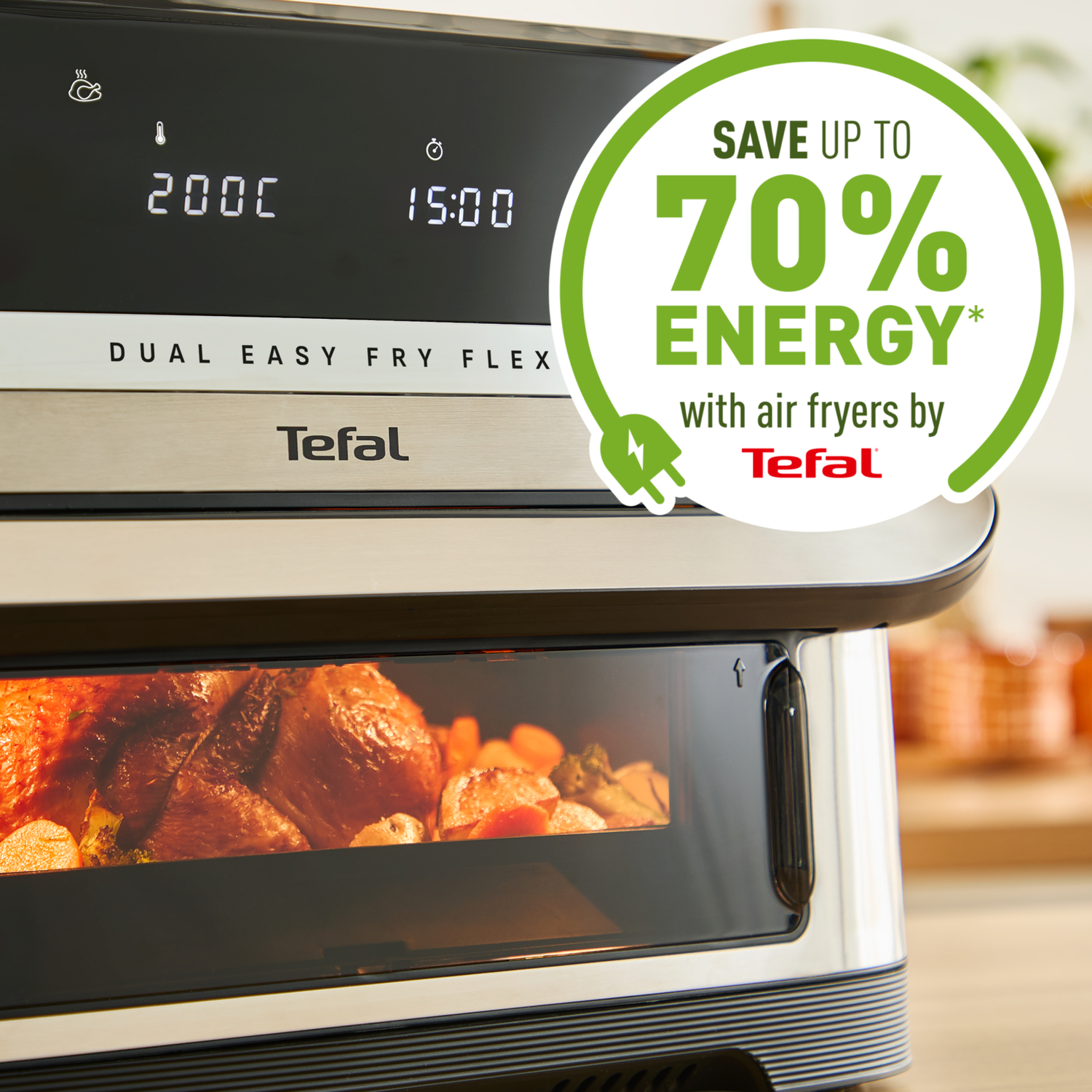 An air fryer oven showing food inside, with text saying it saves up to 70% energy.