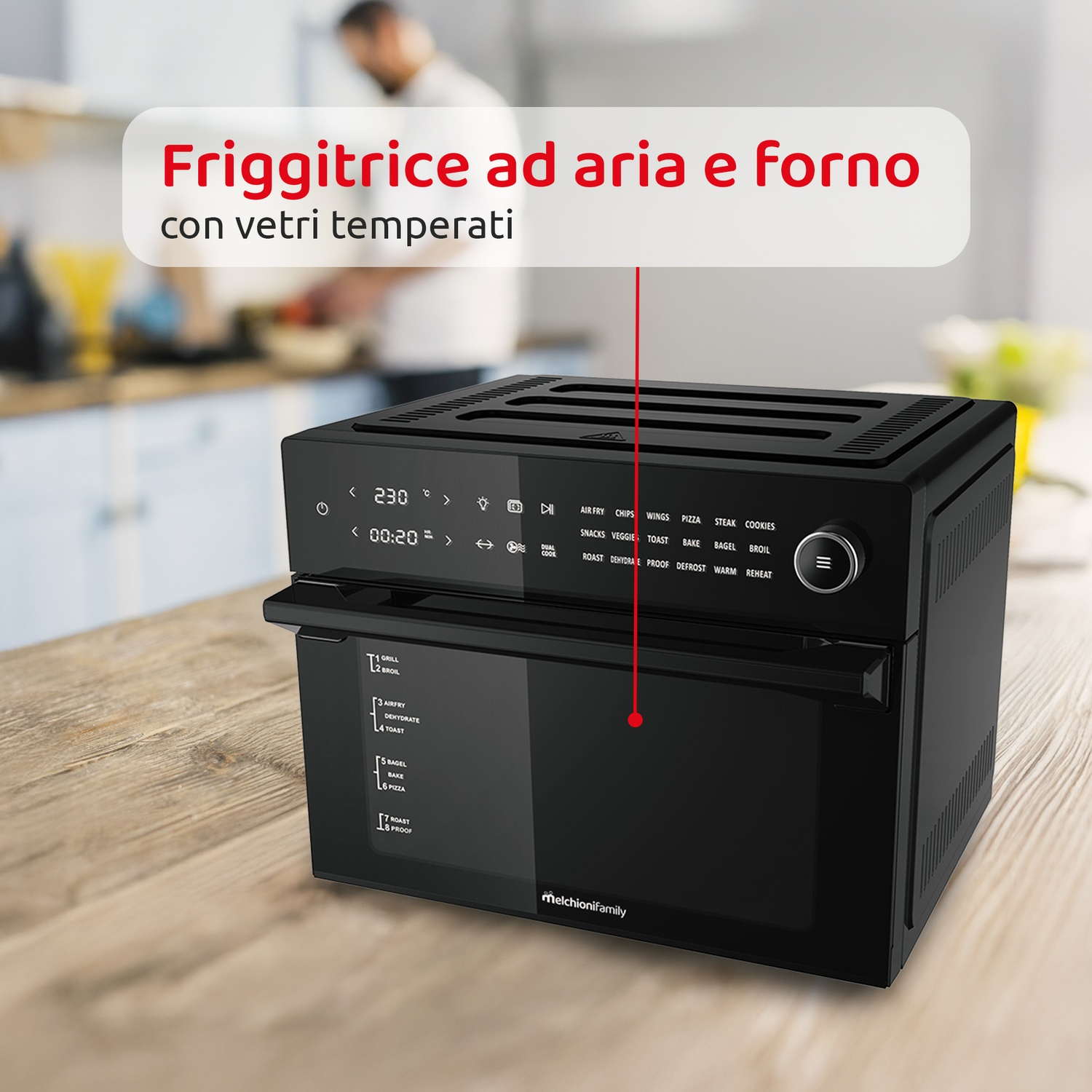 Combinazione di friggitrice ad aria e forno nera con porta a vetro, che mostra l'interno.