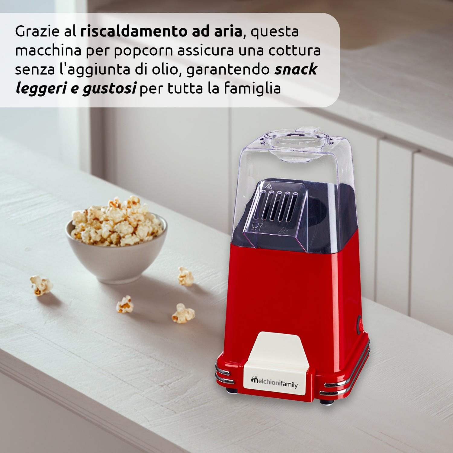 Macchina per popcorn rossa e bianca con una ciotola di popcorn e testo in italiano.