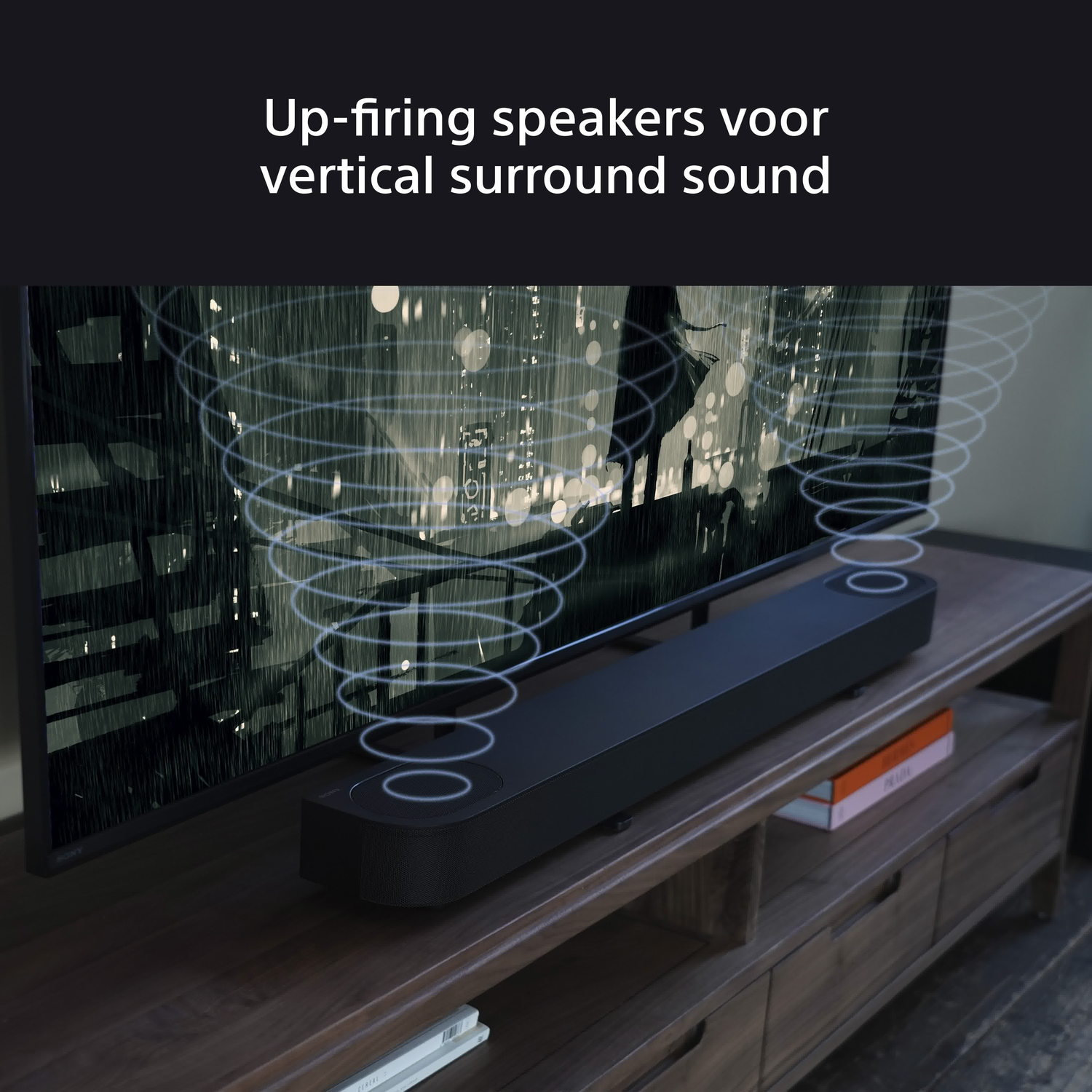 A black soundbar sits below a TV, with sound waves emanating. A wooden cabinet holds the TV and soundbar.