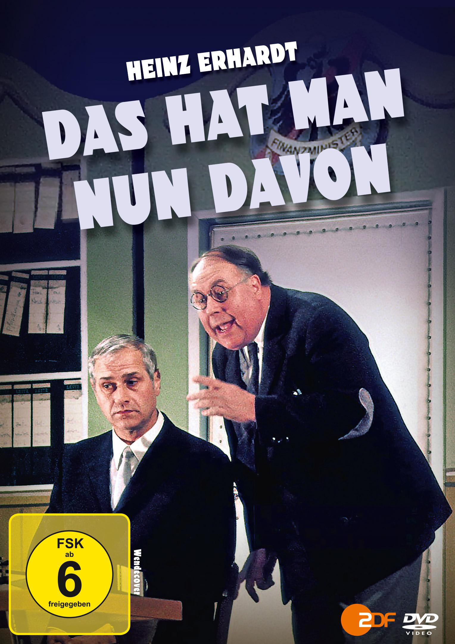 DVD-Cover für 'Das hat man nun davon'. Mit zwei Männern im Anzug, einer zeigt.